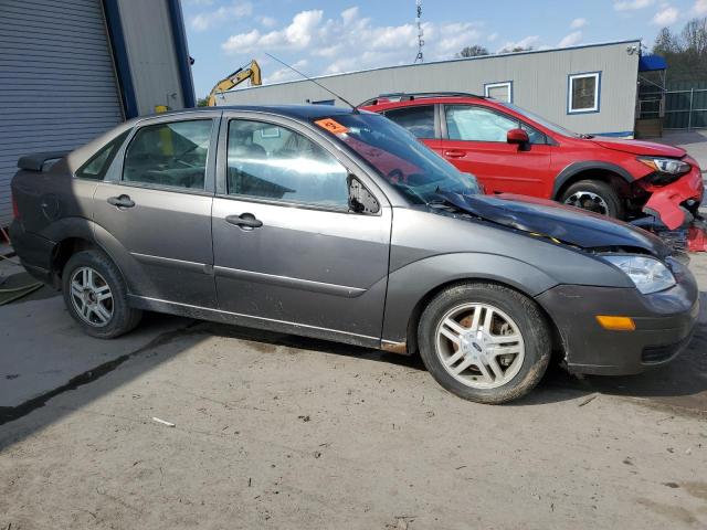 1FAFP34N37W101236 - 2007 FORD FOCUS ZX4 GRAY photo 4