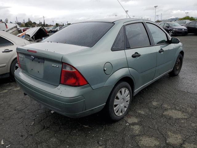 1FAFP34N35W121936 - 2005 FORD FOCUS ZX4 GREEN photo 3