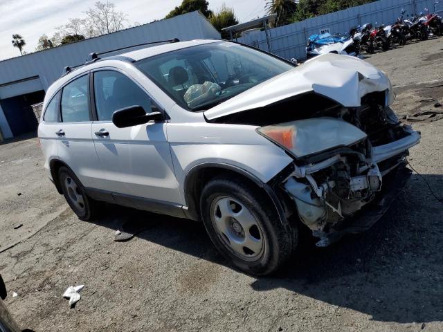 5J6RE38369L024219 - 2009 HONDA CR-V LX WHITE photo 4