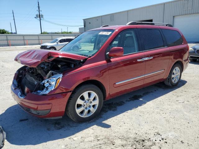 KNDMC233576034601 - 2007 HYUNDAI ENTOURAGE GLS RED photo 1