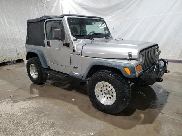 1J4FA29PSYP781168 - 2000 JEEP WRANGLER / SE SILVER photo 4