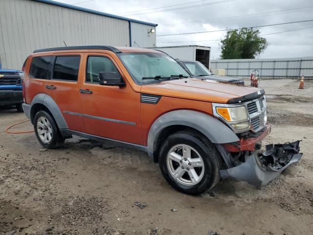 1D8GU28K77W546713 - 2007 DODGE NITRO SXT ORANGE photo 4