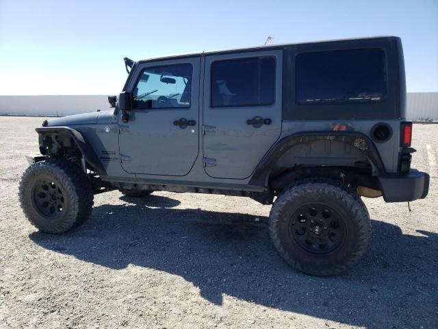 1C4BJWDG4FL689001 - 2015 JEEP WRANGLER U SPORT GRAY photo 2