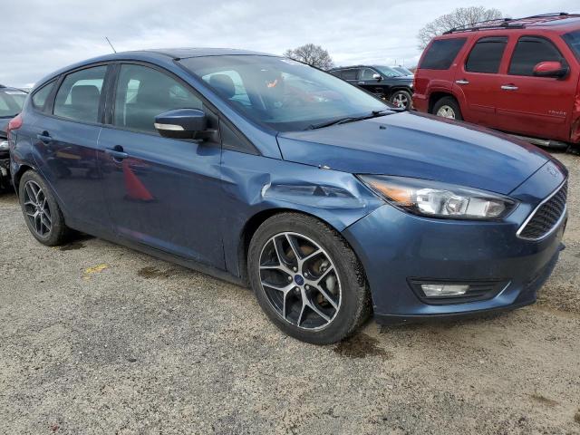 1FADP3M29JL297835 - 2018 FORD FOCUS SEL BLUE photo 4