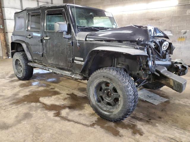 1J4HA3H12BL602330 - 2011 JEEP WRANGLER U SPORT BLACK photo 4