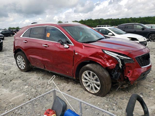 1GYAZAR47NF100794 - 2022 CADILLAC XT4 LUXURY RED photo 4