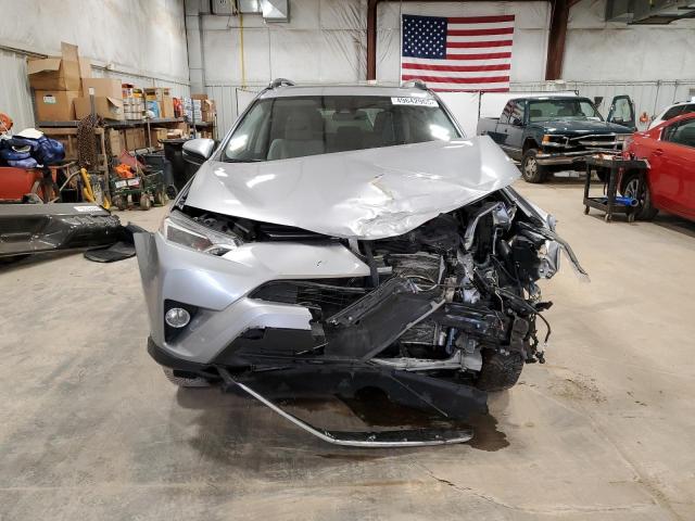 JTMRJREV7JD157080 - 2018 TOYOTA RAV4 HV LE Արծաթագույն լուսանկար 5