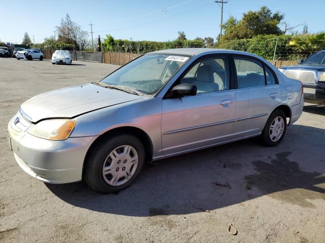 2HGES16502H529232 - 2002 HONDA CIVIC LX SILVER photo 1