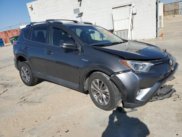 JTMRJREV5GD055950 - 2016 TOYOTA RAV4 HV XLE GRAY photo 4