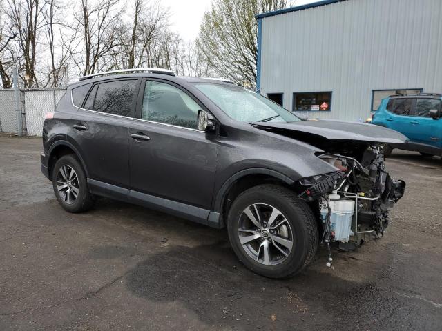 2T3RFREV4GW457186 - 2016 TOYOTA RAV4 XLE GRAY photo 4