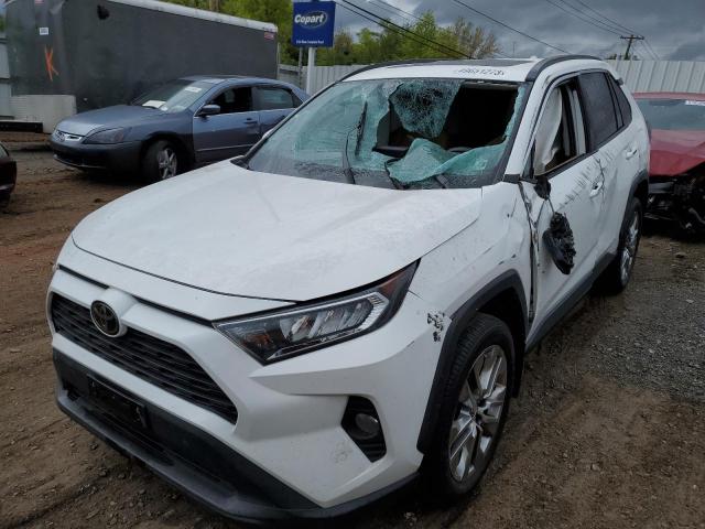 2T3A1RFV0KC045691 - 2019 TOYOTA RAV4 XLE PREMIUM WHITE photo 1