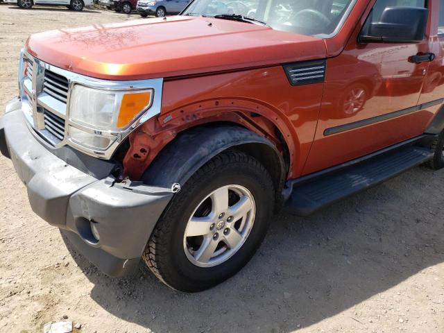 1D8GU28K57W590662 - 2007 DODGE NITRO SXT ORANGE photo 12