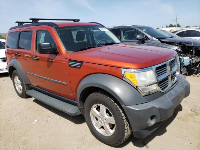 1D8GU28K57W590662 - 2007 DODGE NITRO SXT ORANGE photo 4