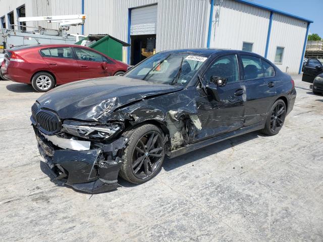 3MW89FF08P8C98667 - 2023 BMW 330XI Սև լուսանկար 1