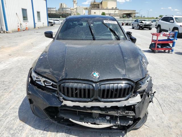 3MW89FF08P8C98667 - 2023 BMW 330XI Սև լուսանկար 5