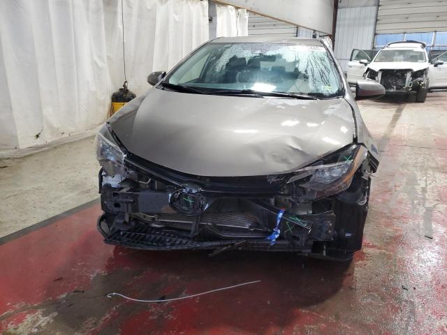 5YFBURHE9KP920669 - 2019 TOYOTA COROLLA L TAN photo 5