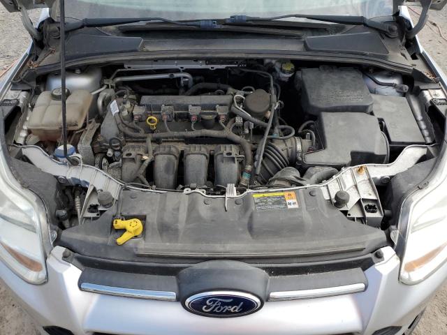 1FAHP3F22CL469642 - 2012 FORD FOCUS SE SILVER photo 11