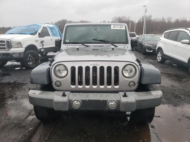 1C4BJWDG5EL288636 - 2014 JEEP WRANGLER U SPORT SILVER photo 5