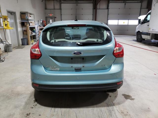 1FAHP3M23CL152357 - 2012 FORD FOCUS SEL TEAL photo 6