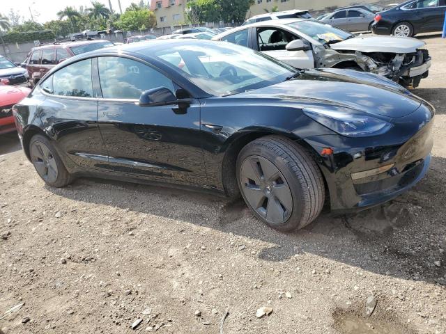 5YJ3E1EA7PF452545 - 2023 TESLA MODEL 3 BLACK photo 4