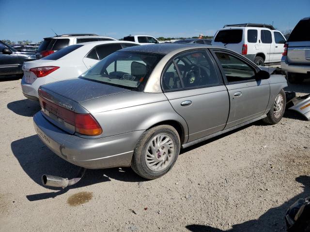 1G8ZJ5276XZ268644 - 1999 SATURN SL2 TAN photo 4