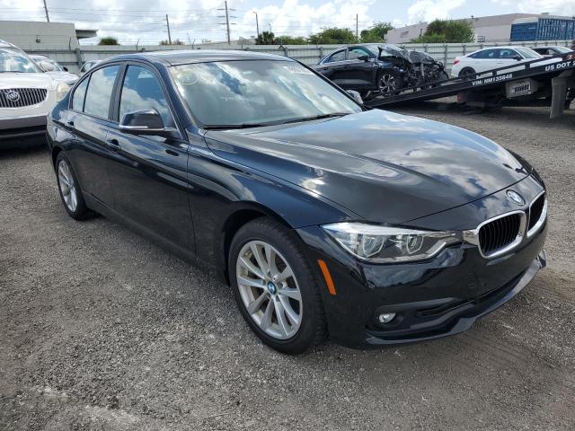 WBA8A9C52JAH12355 - 2018 BMW 320 I BLACK photo 4