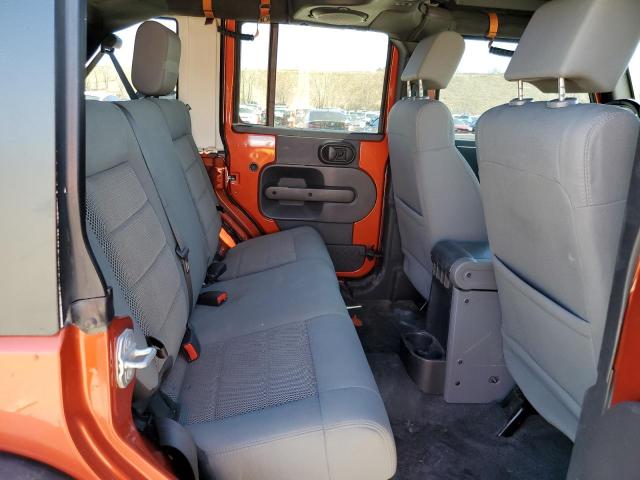 1J4GA69139L738651 - 2009 JEEP WRANGLER RUBICON ORANGE photo 10