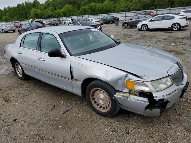 1LNHM81W9XY679394 - 1999 LINCOLN TOWN CAR EXECUTIVE SILVER photo 4