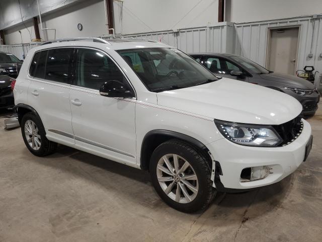 WVGUV7AX8HK012612 - 2017 VOLKSWAGEN TIGUAN SPORT WHITE photo 4