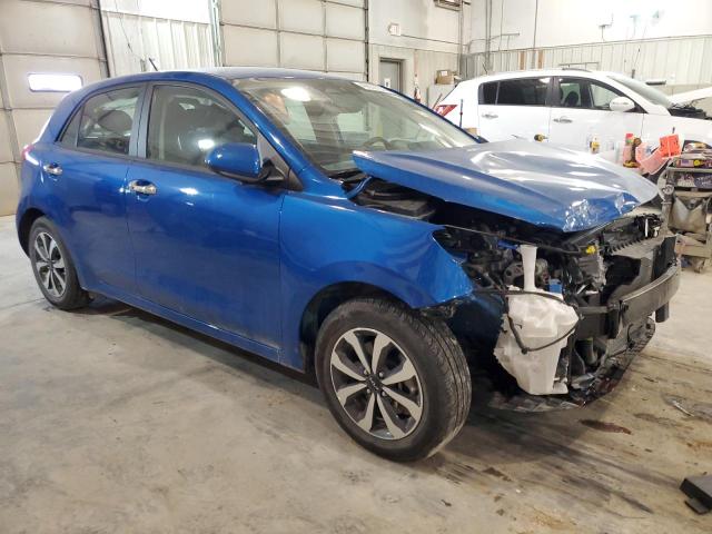 3KPA25AD7NE438641 - 2022 KIA RIO S BLUE photo 4