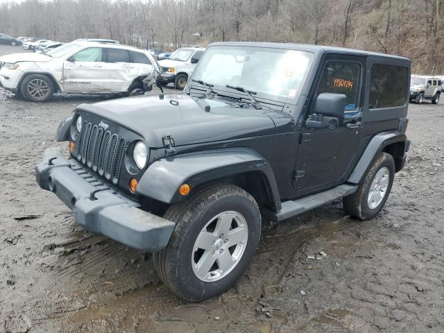 1J4GA5D15BL633116 - 2011 JEEP WRANGLER SAHARA BLACK photo 1