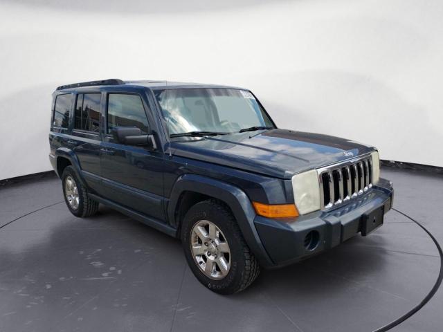 1J8HG48P77C618053 - 2007 JEEP COMMANDER BLUE photo 4