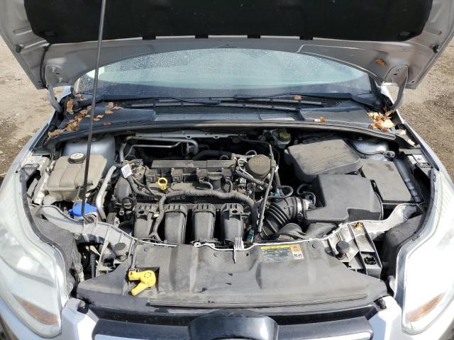 1FAHP3M23CL349187 - 2012 FORD FOCUS SEL SILVER photo 11