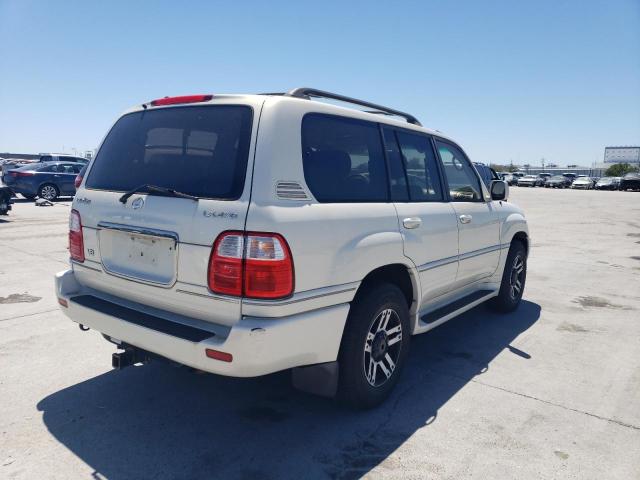 JT6HT00W6X0034962 - 1999 LEXUS LX 470 WHITE photo 3