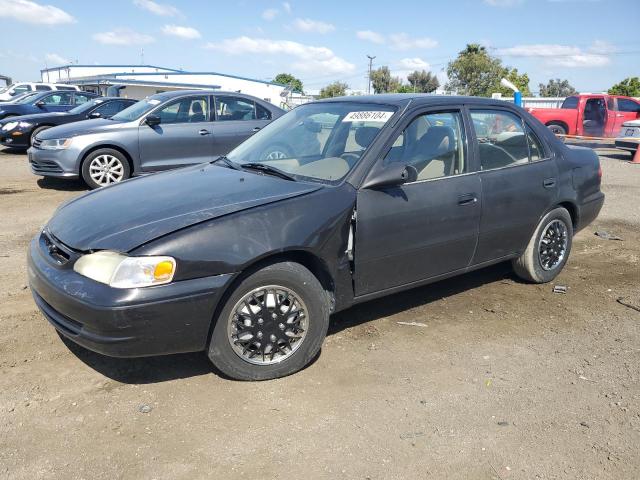 1NXBR12E5XZ152724 - 1999 TOYOTA COROLLA VE BLACK photo 1