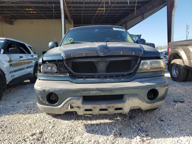 5LMRU27L2XLJ11951 - 1999 LINCOLN NAVIGATOR ლურჯი ფოტო 5