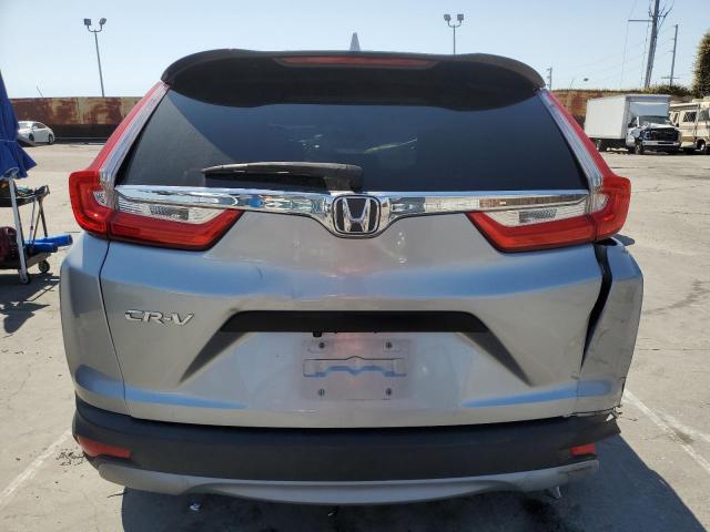 2HKRW5H32JH412328 - 2018 HONDA CR-V LX ვერცხლისფერი ფოტო 6