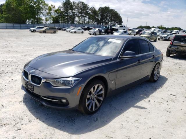 WBA8E1C38HA029247 - 2017 BMW 330E GRAY photo 1