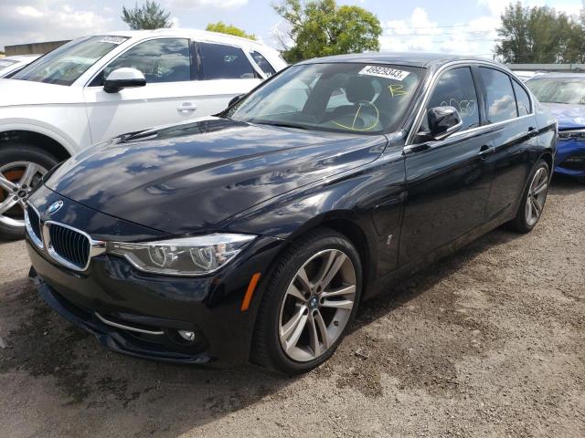 WBA8E1C59JA756906 - 2018 BMW 330E BLACK photo 1