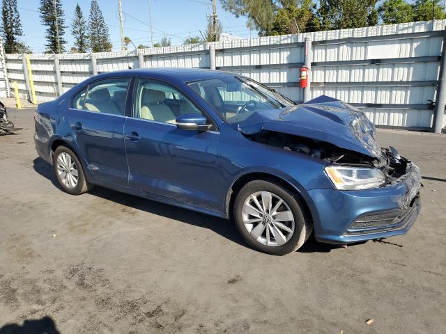 3VWD17AJ2FM414544 - 2015 VOLKSWAGEN JETTA SE BLUE photo 4