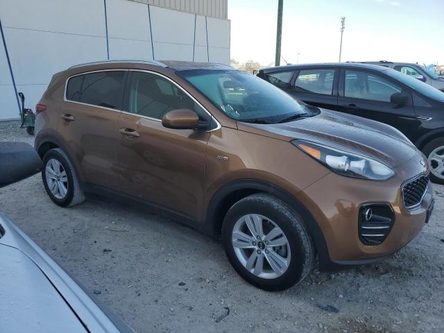 KNDPMCAC1K7526936 - 2019 KIA SPORTAGE LX BROWN photo 4