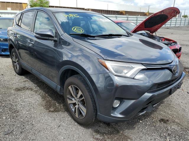 2T3WFREV1JW406707 - 2018 TOYOTA RAV4 ADVENTURE CHARCOAL photo 4