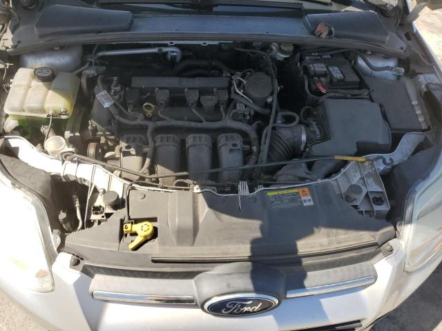 1FAHP3F29CL455429 - 2012 FORD FOCUS SE SILVER photo 11