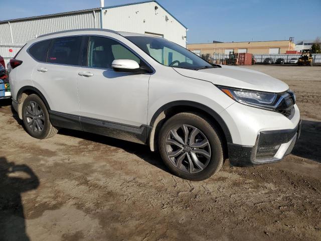 2HKRW2H90NH225632 - 2022 HONDA CR-V TOURING WHITE photo 4