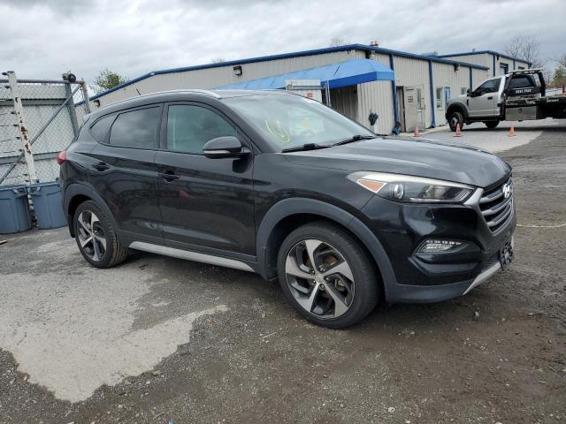 KM8J33A24HU368355 - 2017 HYUNDAI TUCSON LIMITED BLACK photo 4