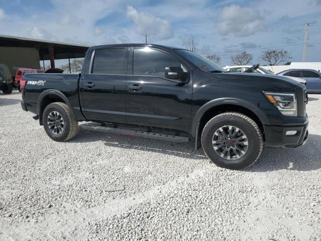 1N6AA1ED2PN105880 - 2023 NISSAN TITAN SV BLACK photo 4