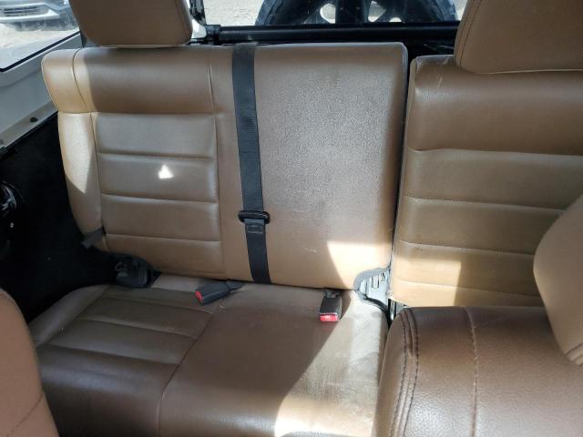 1C4BJWEG4CL107716 - 2012 JEEP WRANGLER U SAHARA GREEN photo 10