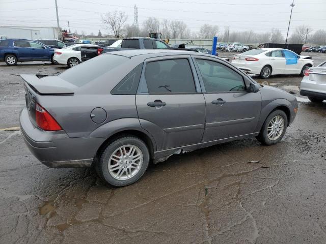 1FAHP34NX7W274826 - 2007 FORD FOCUS ZX4 BLACK photo 3