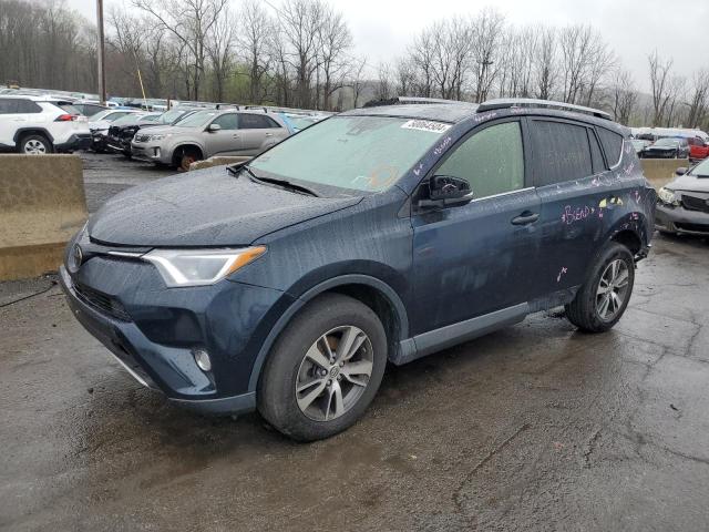 JTMRFREV3HJ171538 - 2017 TOYOTA RAV4 XLE BLUE photo 1