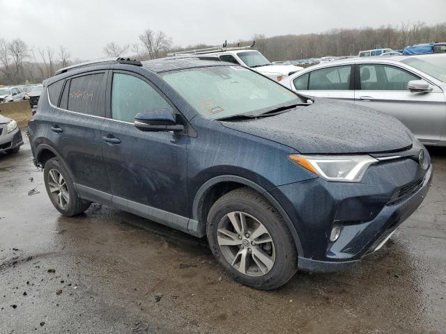 JTMRFREV3HJ171538 - 2017 TOYOTA RAV4 XLE BLUE photo 4